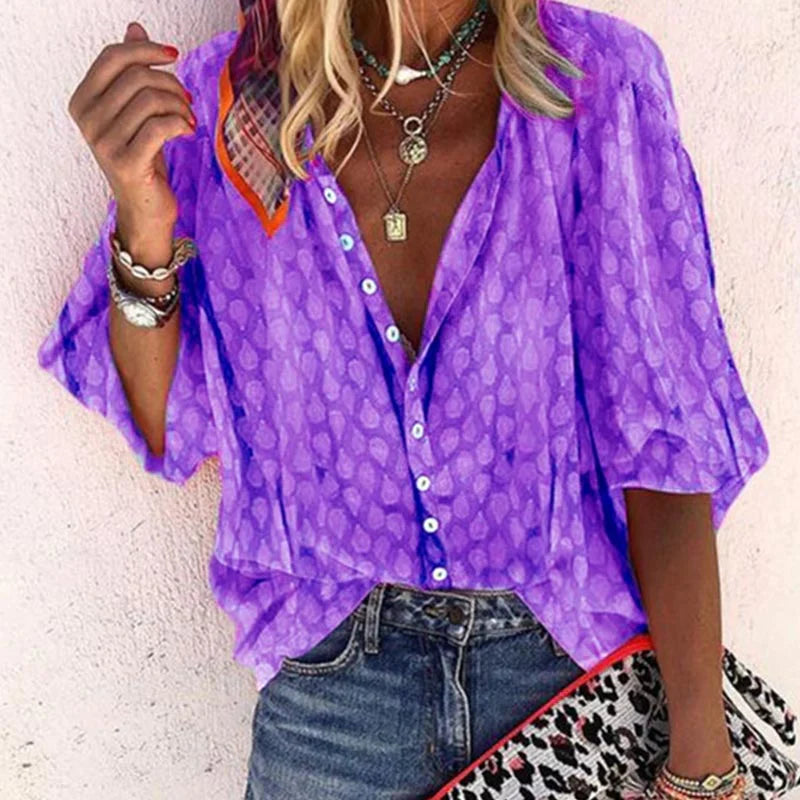 Women's blouse with pattern, button placket and V-neck
