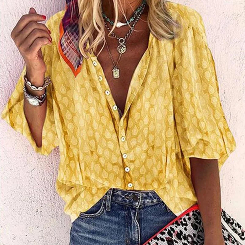Women's blouse with pattern, button placket and V-neck