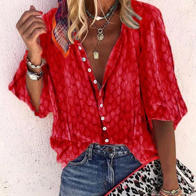 Women's blouse with pattern, button placket and V-neck